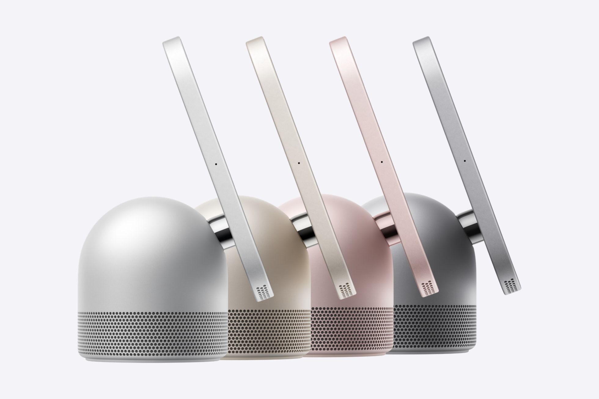 Four Apple HomeView devices in profile, each a domed speaker base with a screen on a hinge, in silver, starlight, rose pink and space gray.